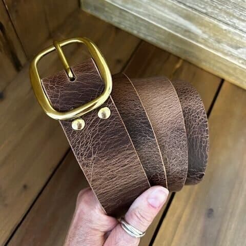 distressed brown leather belt with brass buckle
