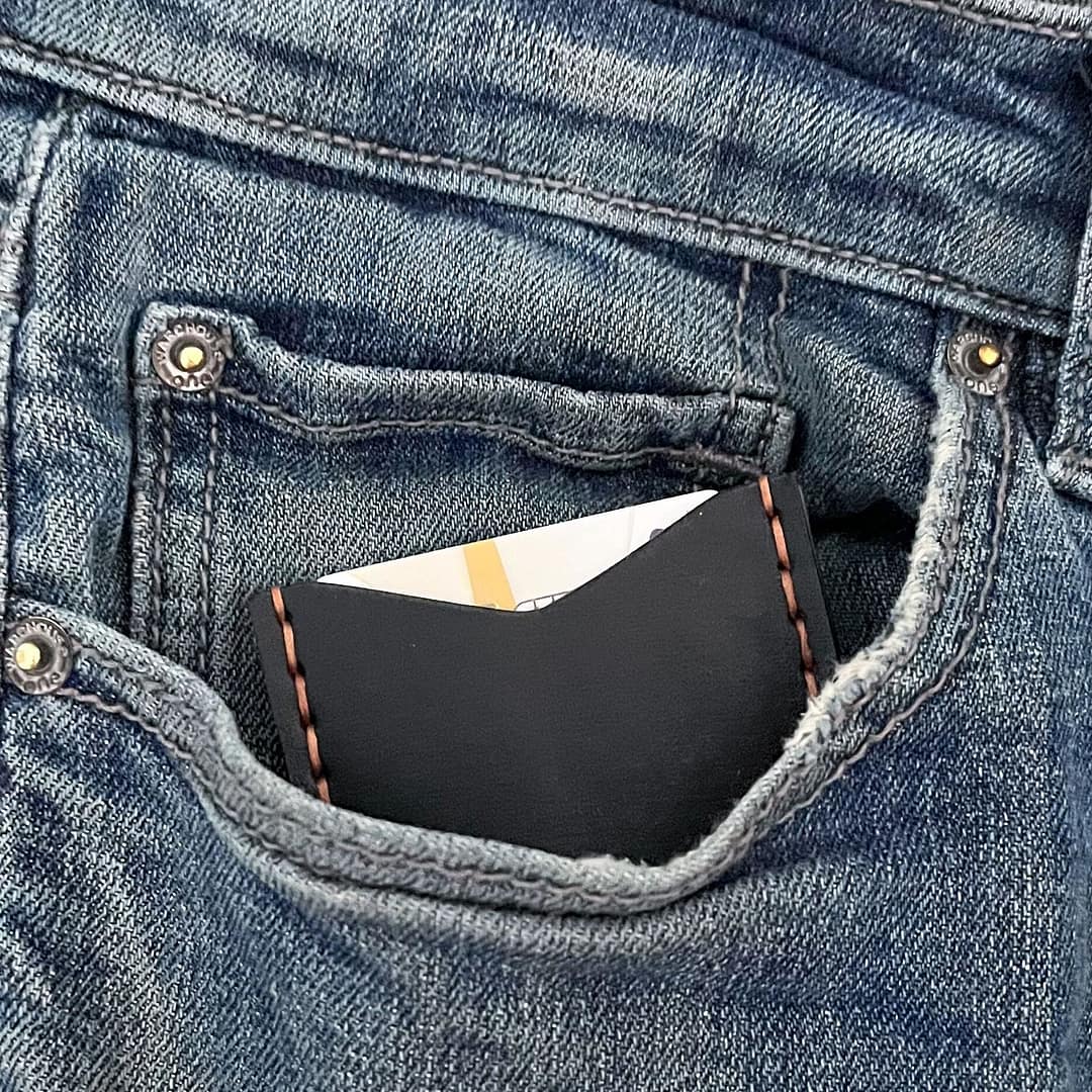 leather front pocket wallet in jeans pocket