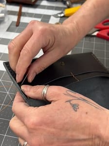 Hand sewing leather